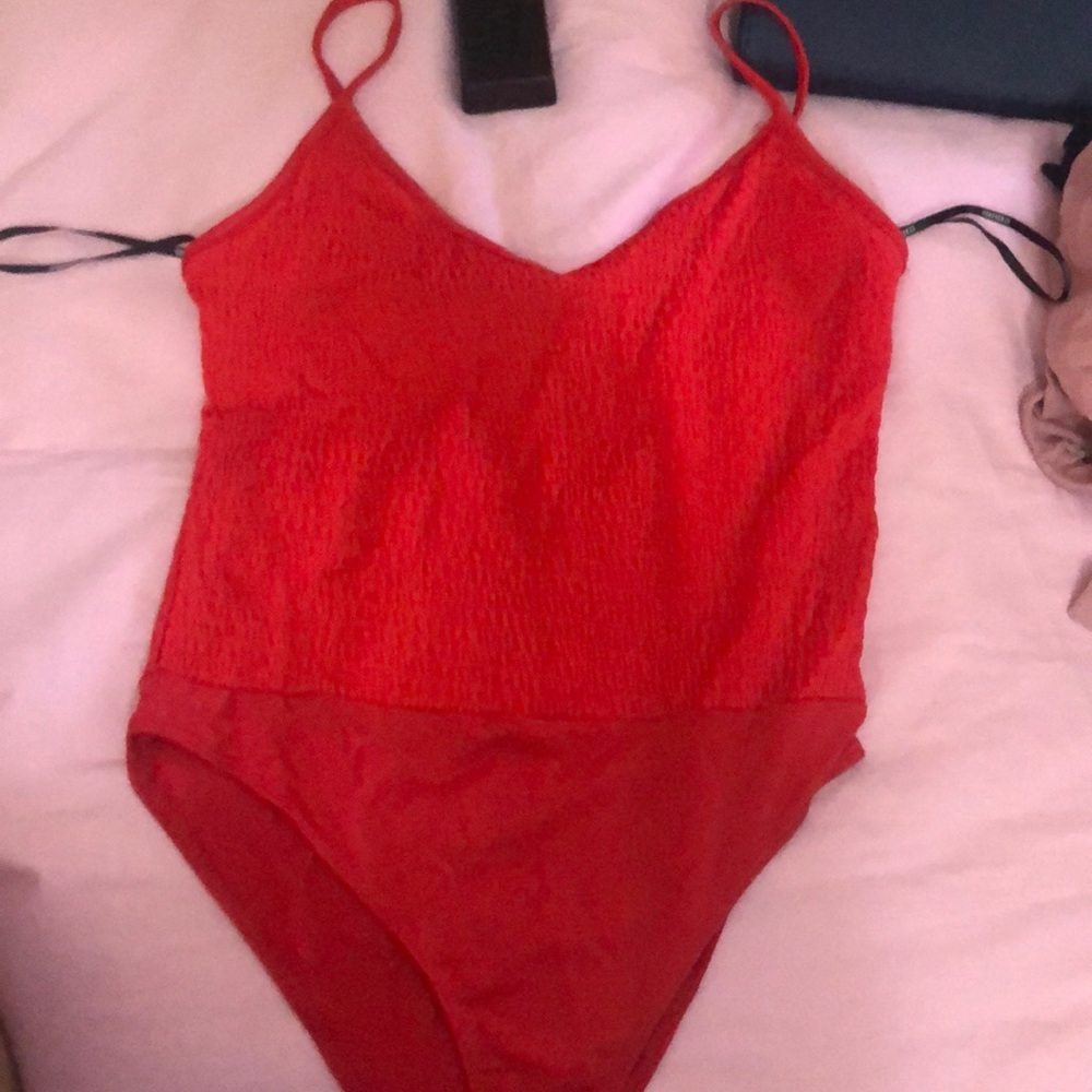 Beautiful red v cut bodysuit
